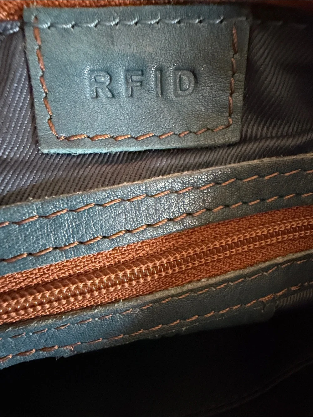 ili New York Denim Blue Brown Whip Stitch Trim Leather Wristlet